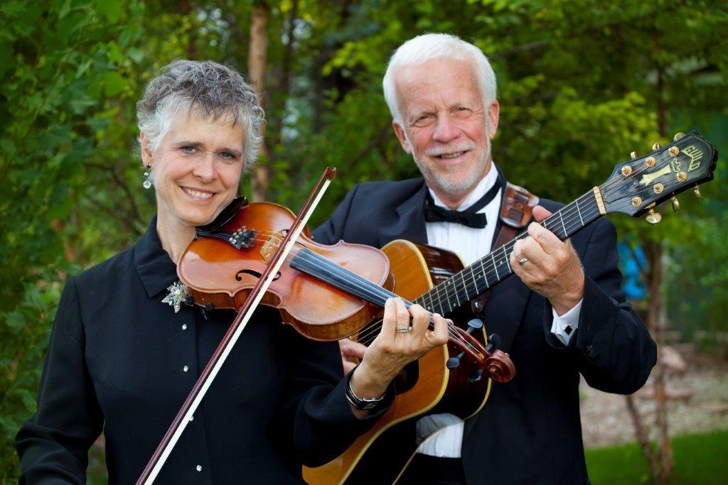 pic.strolling.J&M.instruments playing.horizontal LARGE FILE JSO